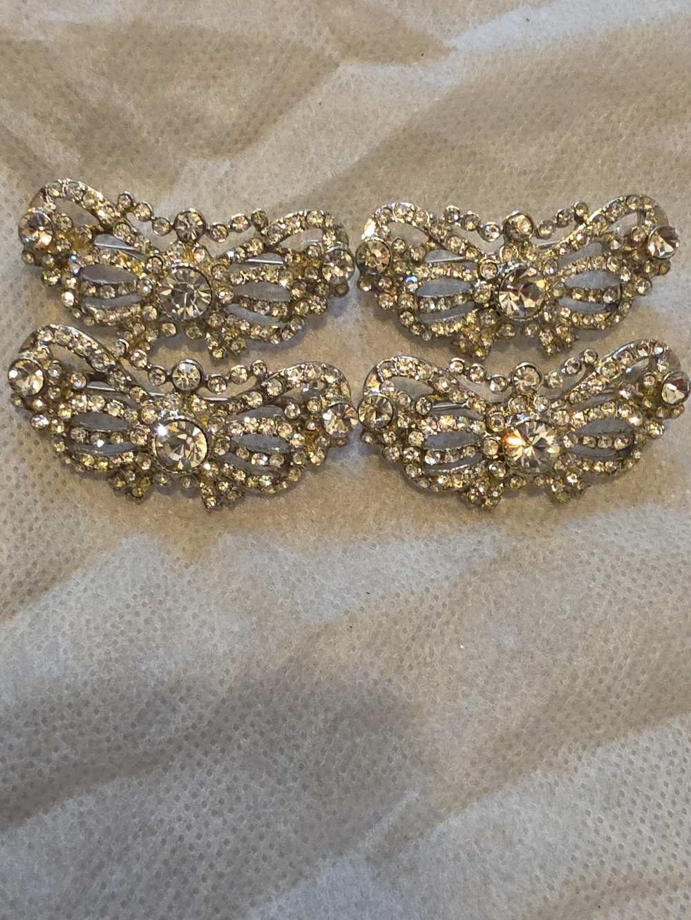 VIntage, silver-tone crystal rhinestone brooch with an ornate bow or wing-like f - Picture 3 of 5
